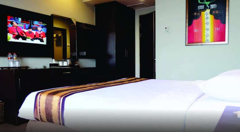 Imagen de la habitación del Hotel Grand Palace Makassar. Foto 15