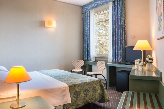 Imagen de la habitación del Hotel Grand Panoramic. Foto 11