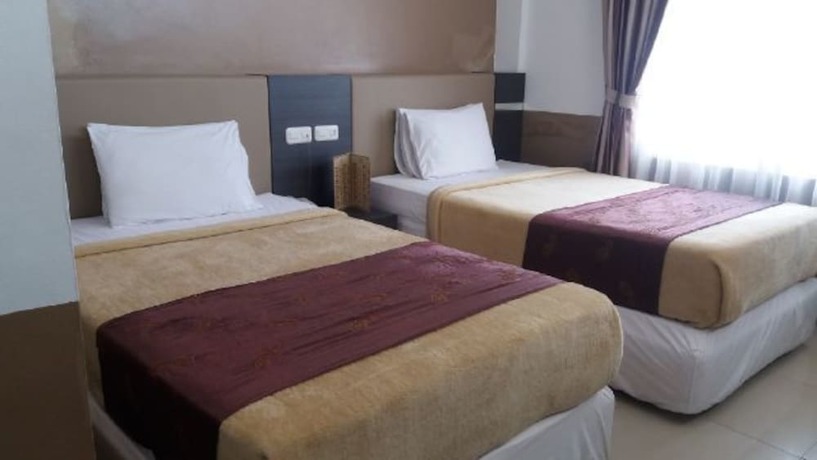 Imagen de la habitación del Hotel Grand Paradise Hotel. Foto 3