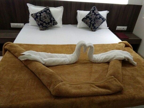 Imagen de la habitación del Hotel Grand Parivaar. Foto 14