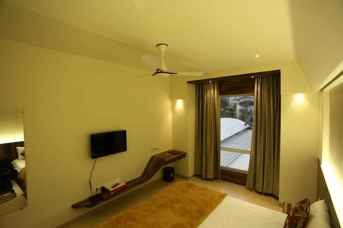 Imagen de la habitación del Hotel Grand Parivaar. Foto 15