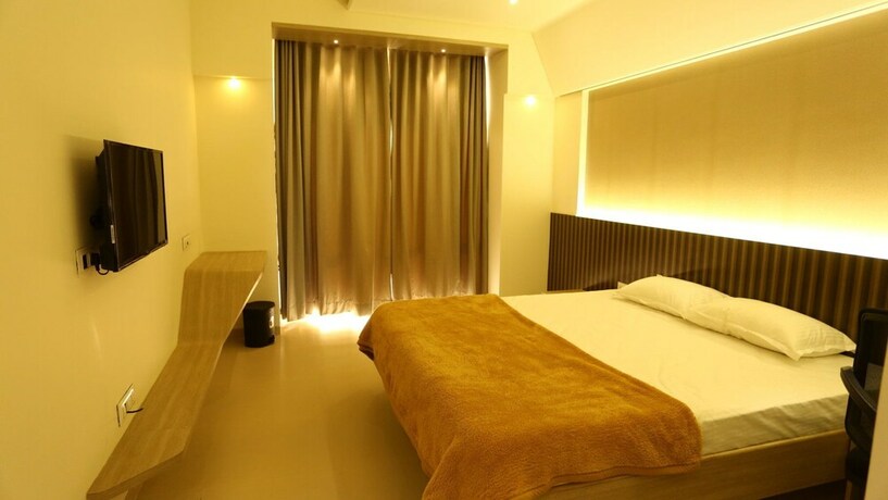 Imagen de la habitación del Hotel Grand Parivaar. Foto 17