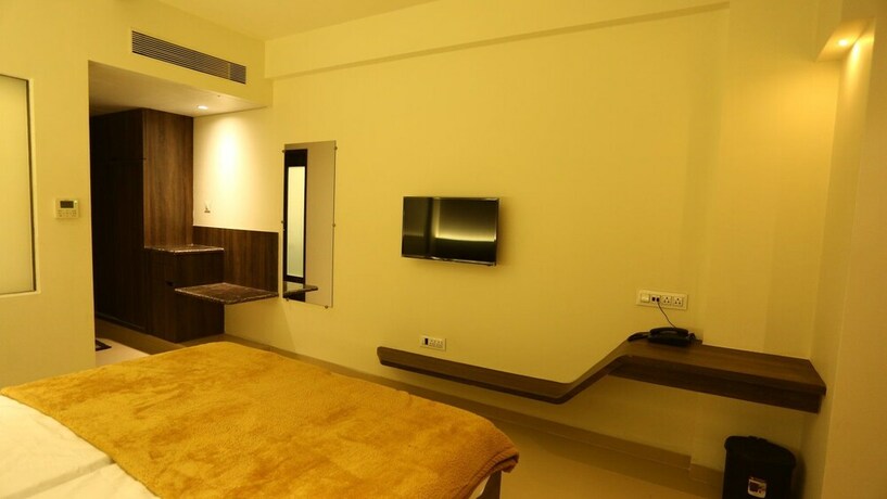 Imagen de la habitación del Hotel Grand Parivaar. Foto 18