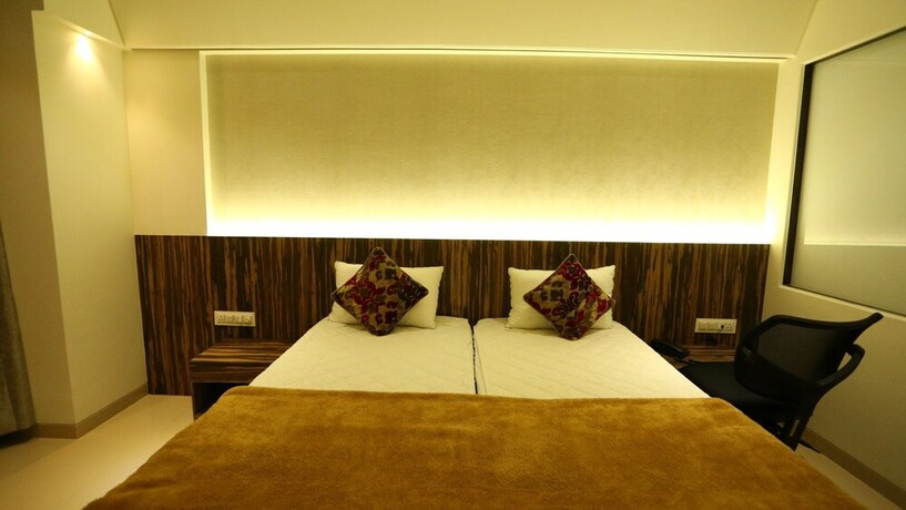 Imagen de la habitación del Hotel Grand Parivaar. Foto 20