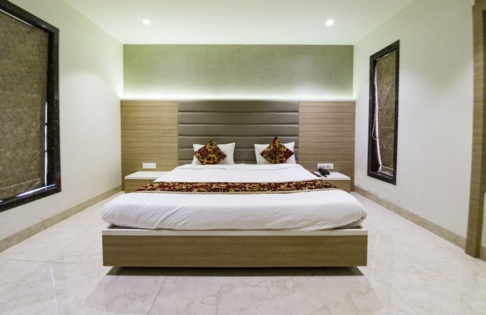 Imagen de la habitación del Hotel Grand Parivaar. Foto 23