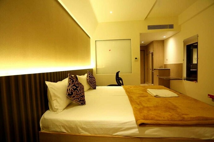 Imagen de la habitación del Hotel Grand Parivaar. Foto 27