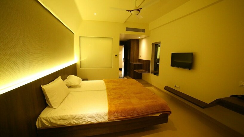 Imagen de la habitación del Hotel Grand Parivaar. Foto 28