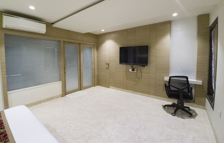 Imagen de la habitación del Hotel Grand Parivaar. Foto 30