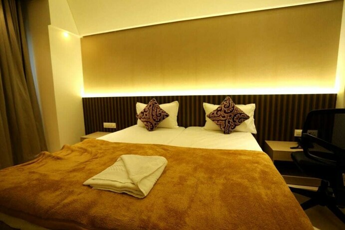 Imagen de la habitación del Hotel Grand Parivaar. Foto 31