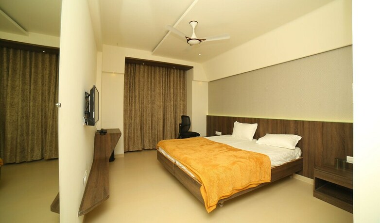 Imagen de la habitación del Hotel Grand Parivaar. Foto 32