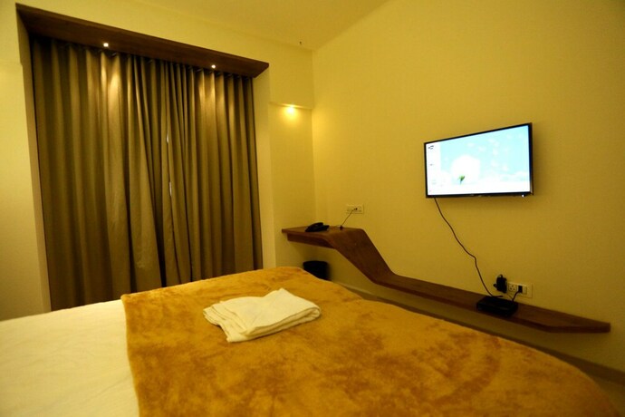 Imagen de la habitación del Hotel Grand Parivaar. Foto 33