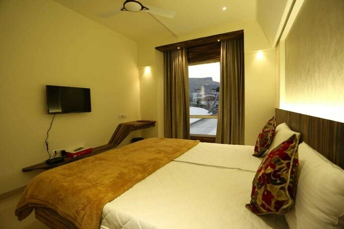 Imagen de la habitación del Hotel Grand Parivaar. Foto 34