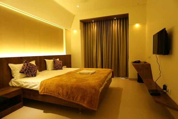 Imagen de la habitación del Hotel Grand Parivaar. Foto 36