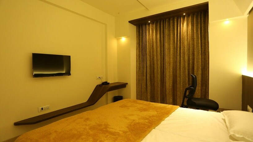 Imagen de la habitación del Hotel Grand Parivaar. Foto 38