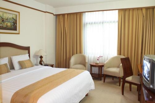 Imagen de la habitación del Hotel Grand Pasundan Convention. Foto 7
