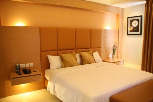 Imagen de la habitación del Hotel Grand Pasundan Convention. Foto 10