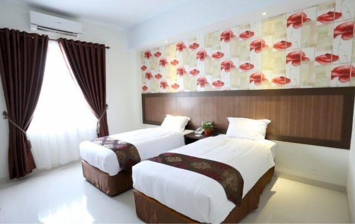 Imagen de la habitación del Hotel Grand Permata Hati. Foto 9