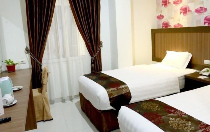 Imagen de la habitación del Hotel Grand Permata Hati. Foto 15