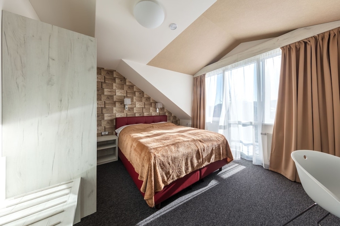 Imagen de la habitación del Hotel Grand Petit. Foto 2