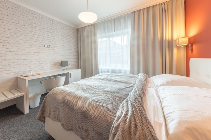 Imagen de la habitación del Hotel Grand Petit. Foto 4