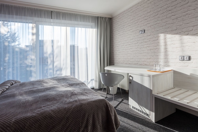 Imagen de la habitación del Hotel Grand Petit. Foto 5