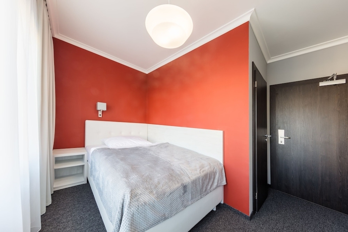 Imagen de la habitación del Hotel Grand Petit. Foto 6