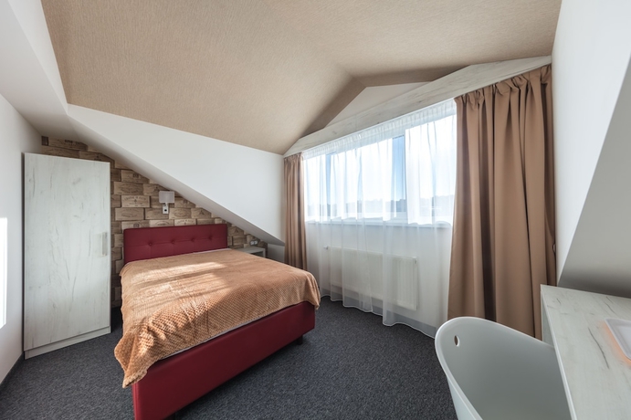 Imagen de la habitación del Hotel Grand Petit. Foto 9