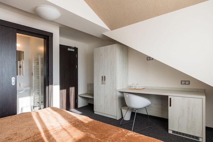 Imagen de la habitación del Hotel Grand Petit. Foto 10