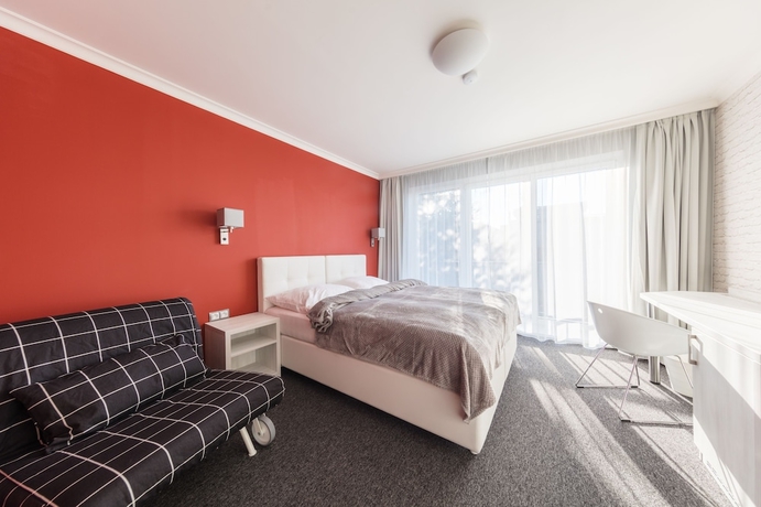 Imagen de la habitación del Hotel Grand Petit. Foto 16
