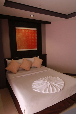 Imagen de la habitación del Hotel Grand Pinnacle. Foto 4