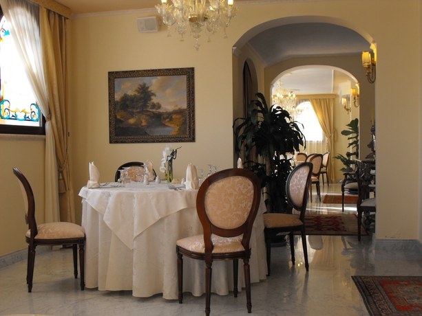 Imagen del bar/restaurante del Hotel Grand President Olbia. Foto 7