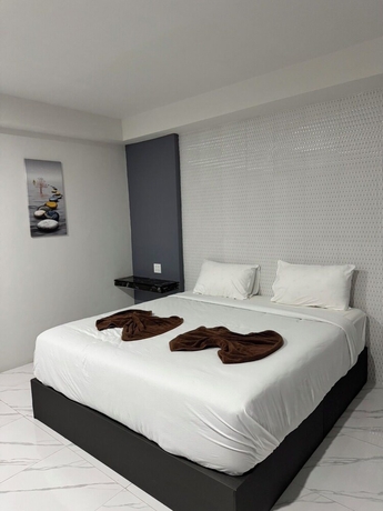 Imagen de la habitación del Hotel Grand Pruksasiri Chaiyaphum. Foto 3