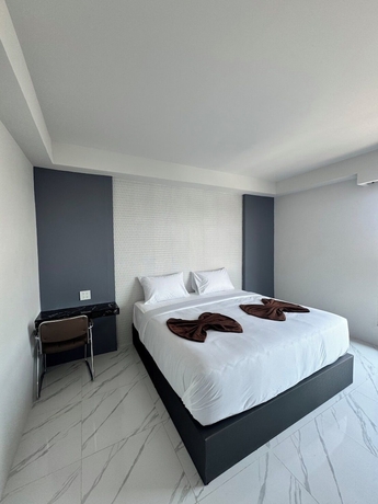 Imagen de la habitación del Hotel Grand Pruksasiri Chaiyaphum. Foto 4