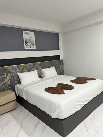 Imagen de la habitación del Hotel Grand Pruksasiri Chaiyaphum. Foto 8