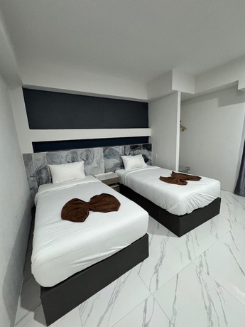 Imagen de la habitación del Hotel Grand Pruksasiri Chaiyaphum. Foto 9