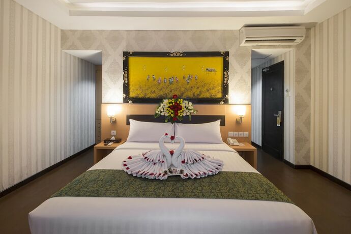 Imagen de la habitación del Hotel Grand Puri Saron Yogyakarta. Foto 16