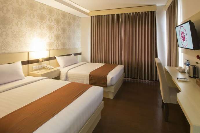 Imagen de la habitación del Hotel Grand Puri Saron Yogyakarta. Foto 19