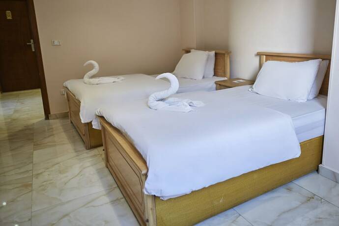 Imagen de la habitación del Hotel Grand Pyramids View Guesthouse. Foto 13