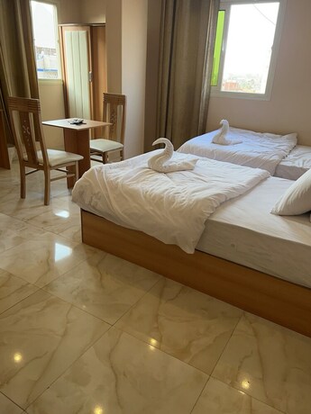 Imagen de la habitación del Hotel Grand Pyramids View Guesthouse. Foto 18