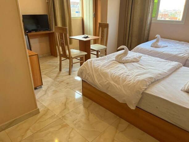 Imagen de la habitación del Hotel Grand Pyramids View Guesthouse. Foto 19