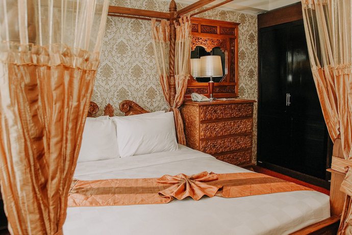 Imagen de la habitación del Hotel Grand Q Gorontalo. Foto 4