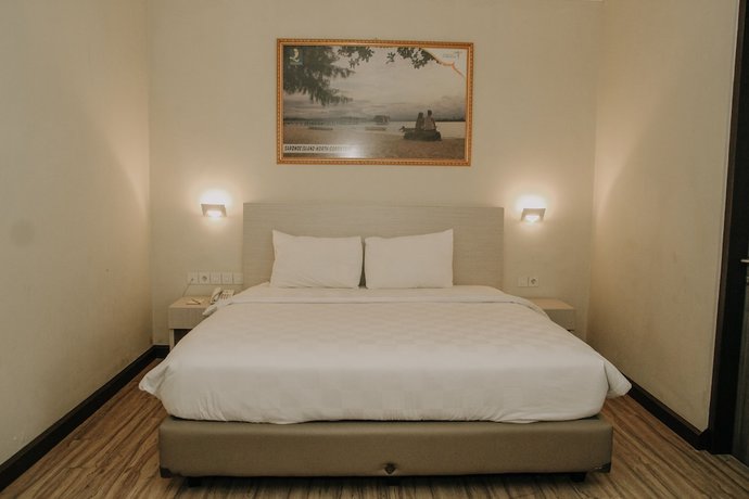 Imagen de la habitación del Hotel Grand Q Gorontalo. Foto 7