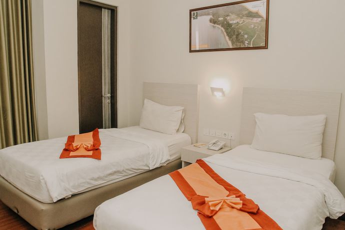 Imagen de la habitación del Hotel Grand Q Gorontalo. Foto 11