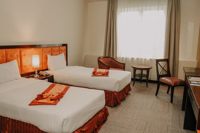 Imagen de la habitación del Hotel Grand Q Gorontalo. Foto 13