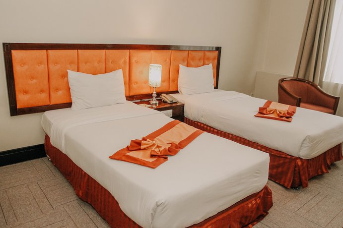 Imagen de la habitación del Hotel Grand Q Gorontalo. Foto 15