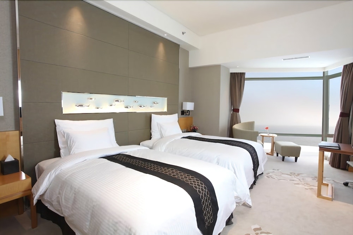Imagen de la habitación del Hotel Grand Qinhuang. Foto 11