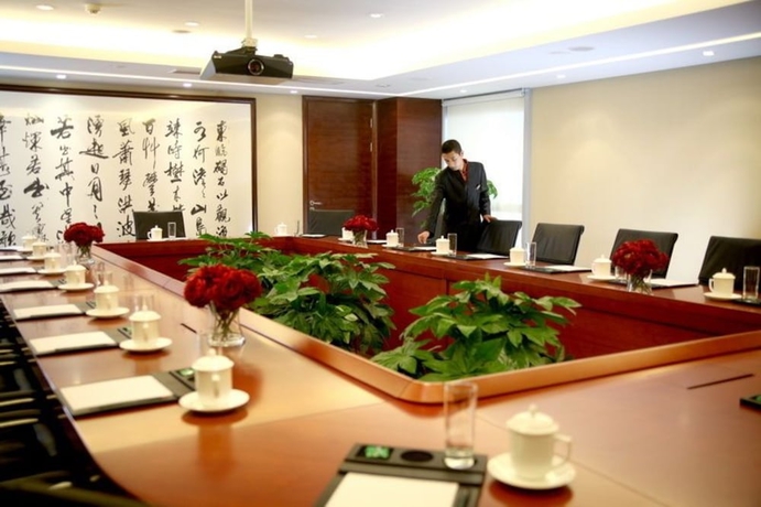 Imagen de los interiores del Hotel Grand Qinhuang. Foto 18