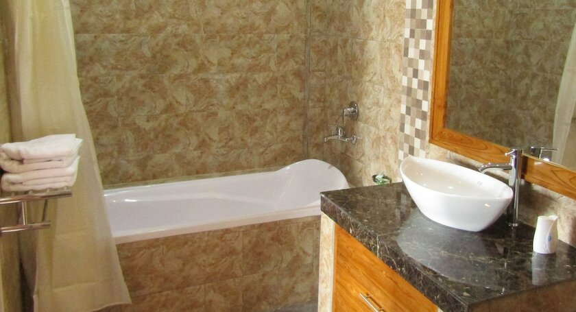Imagen de la habitación del Hotel Grand Raka Homestay. Foto 17