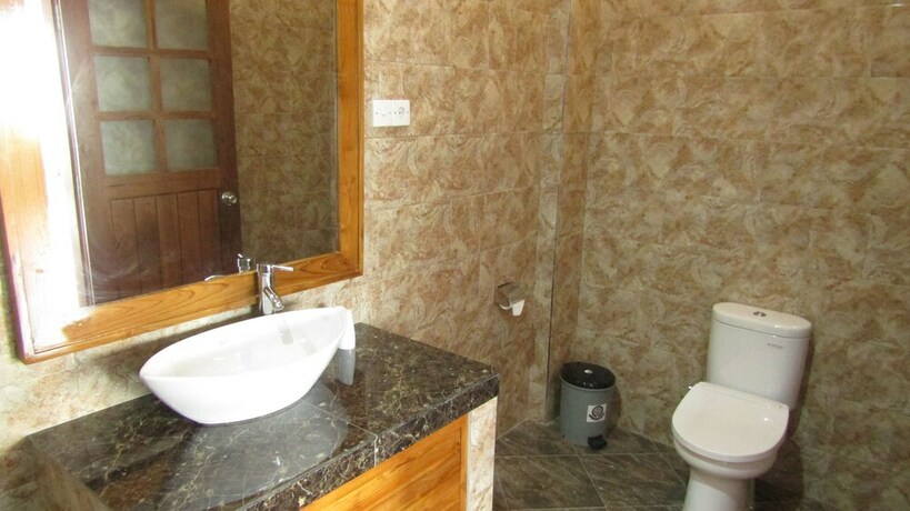 Imagen de la habitación del Hotel Grand Raka Homestay. Foto 19