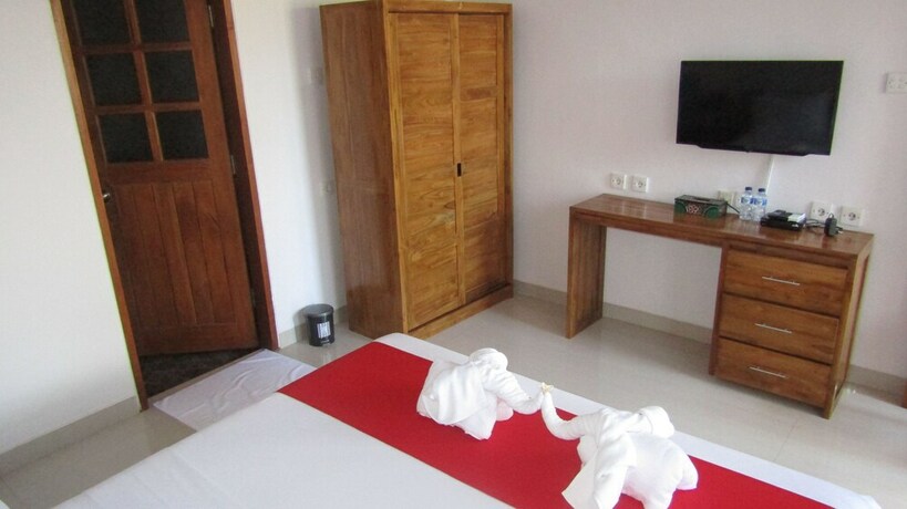 Imagen de la habitación del Hotel Grand Raka Homestay. Foto 20